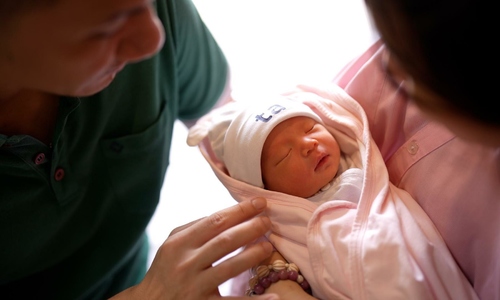 Efforts to save pregnancy for a mother with twisted ovarian tumor