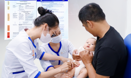 Why is polio vaccination still necessary even though Vietnam has eliminated the disease?