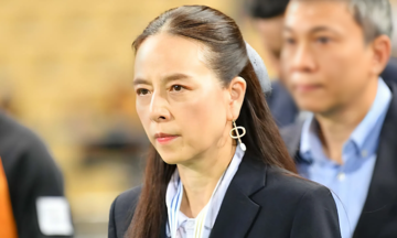 Madam Pang wears 20,000 USD earrings