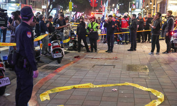 Knife and smoke bomb attack at Taiwan train station leaves three dead