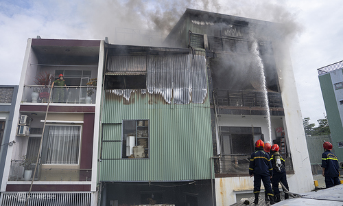 14 fire trucks battle house blaze in alley for 2 hours
