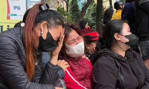 Traders weep as market burns at dawn