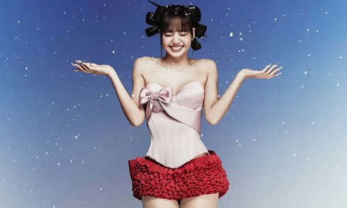 Lisa wears Vietnamese fashion house designs for Christmas