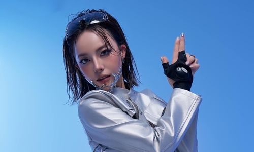 Outfits highlighting the curves of Vietnam's 'shooting queen'