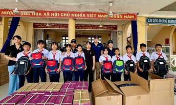 Quoc Huy Anh Corp and PaperOne support central Vietnam students after floods