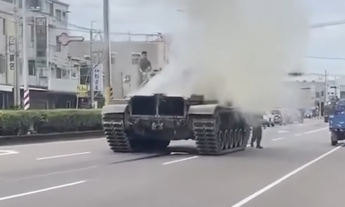 Tank billows thick smoke on Taiwan street