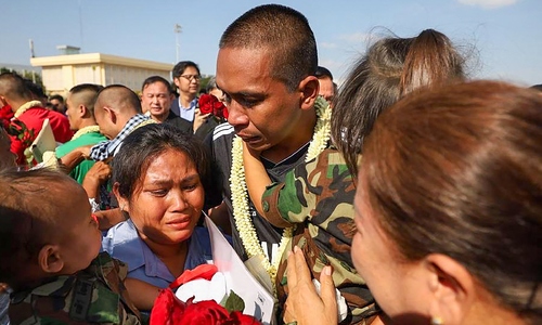 Cambodian prisoners of war welcomed as heroes upon return