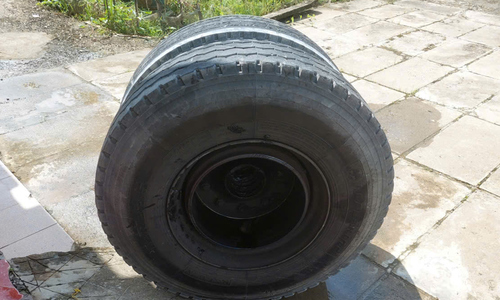 Tractor-trailer wheel detaches, critically injuring woman