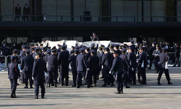 Nude man causes disturbance during emperor's speech