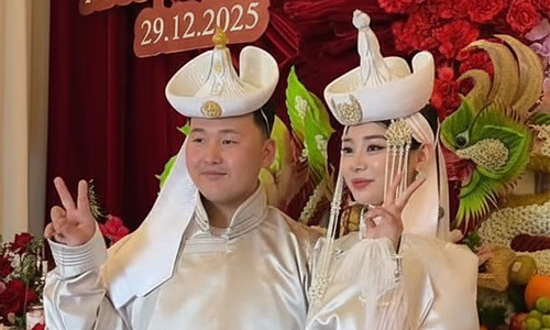 Mongolian attire draws attention at Vietnamese wedding procession