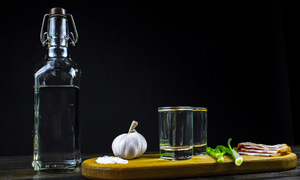 Should garlic-infused wine be consumed to treat the flu?