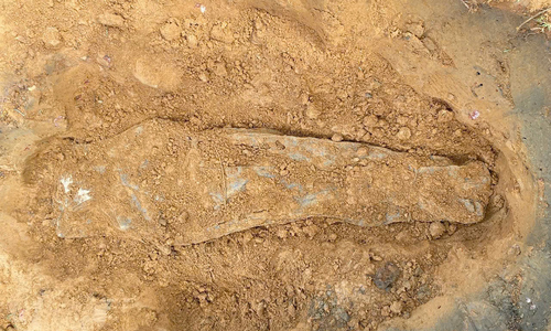 Two fallen soldiers' remains found with leather bags containing documents