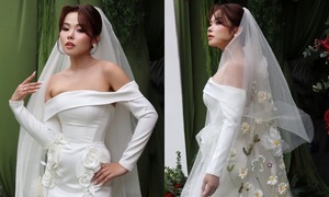 Truong Thao Nhi's wedding attire embroidered with chrysanthemums