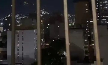 Unidentified drones fly over Venezuelan presidential palace, security forces open fire