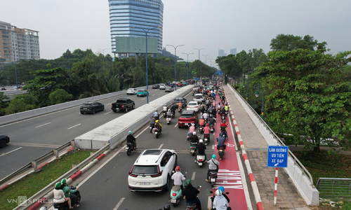 Motorcycles overflow into dedicated bicycle lane in Ho Chi Minh City