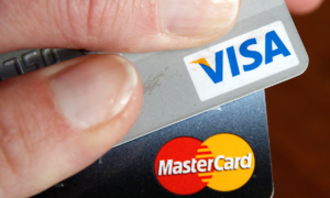 Trump urges credit card companies to cut interest rates from 20% to 10%