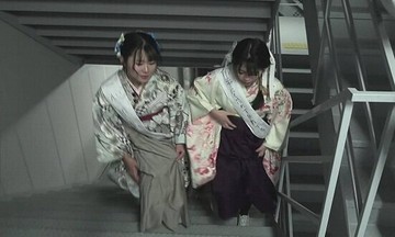Japanese young women climb 60 floors to mark coming of age