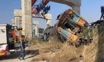 Aftermath of crane collapse onto train in Thailand