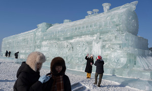 Sparkling ice trains and castles at Harbin festival