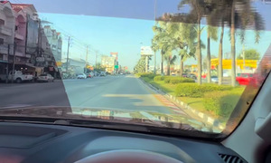 Driver cuts window film for clear visibility