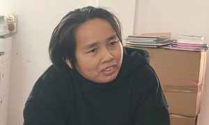 Woman accused of slandering officials, authorities