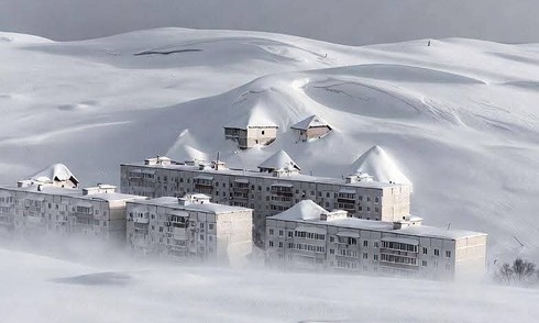 Record-breaking snowstorm buries homes in Russia's Far East