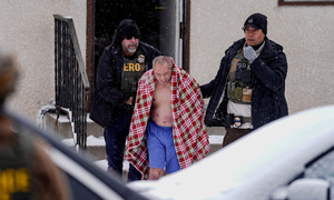 Laotian American dragged away by ICE agents while singing karaoke at home