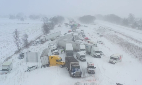 More than 100 vehicles in Michigan pile-up amid snowstorm