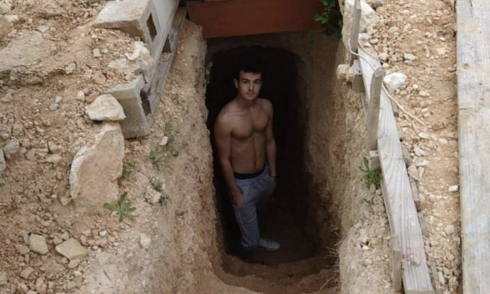 Young man digs underground shelter after argument with parents