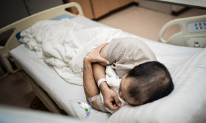 Why do people with meningitis fear light?