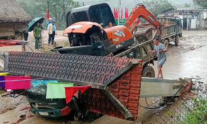 Dump truck pulls down archway, two people dead