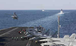 Iran warns of all-out war if attacked