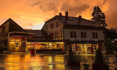 The room where guests eat and sleep in two countries at once