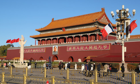 China warns against 'sitting idle' officials