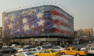 Iran unveils billboard depicting bloody US aircraft carrier, warns US to 'sow the wind, reap the whirlwind'