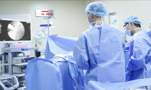 Combined kidney stone lithotripsy and prostate enlargement treatment