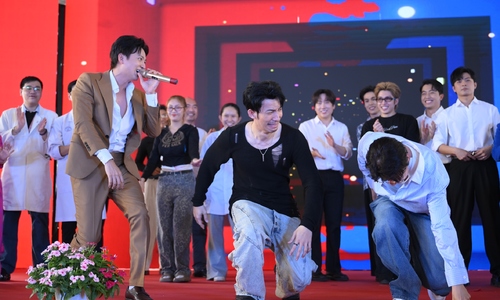 Truong Giang and vietnamese stars energize cho ray hospital's flower street