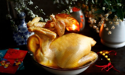 Boiling Tet chicken: wait for it to float or poke the thigh?