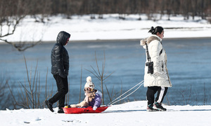 How much income do Americans need to stay home with children?