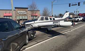Plane makes emergency landing on road, crashes into vehicles