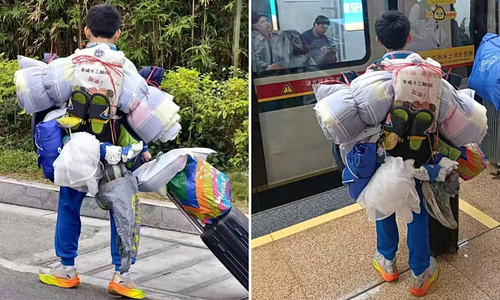 Teen carrying "mountain of luggage" home for Tet goes viral in China