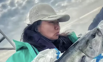 Female director quits corporate life for isolated island fish farm