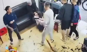 Gang-related assault with a gun over a 10 million Vietnamese dong debt