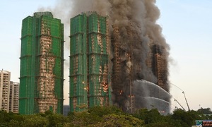 Hong Kong to spend 870 million USD to acquire seven burnt apartment buildings