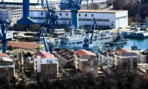 Chinese warship fitted with largest naval gun ever seen