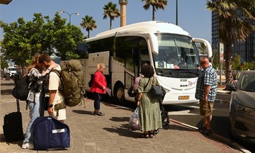 Australia urges diplomats' families in Middle East to evacuate