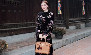 Hoa Minzy styles ao dai with luxury bag collection