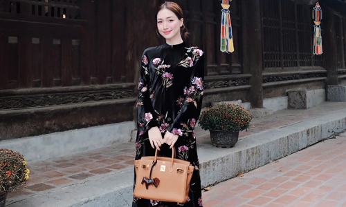Hoa Minzy styles ao dai with luxury bag collection