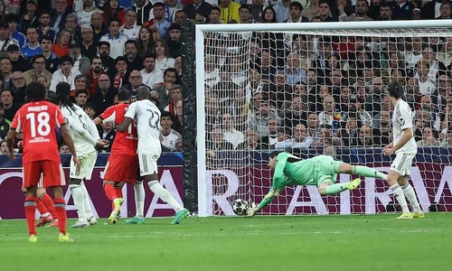 Courtois credits volleyball genes for his crucial save for Real