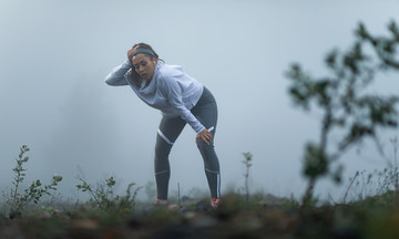 Why can winning create pressure for runners?